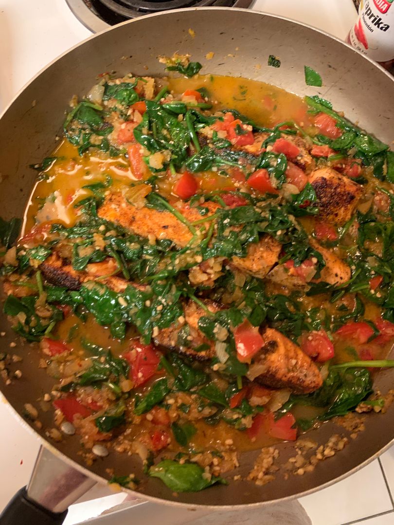 TUSCAN GARLIC SALMON SKILLET WITH SPINACH AND TOMATO