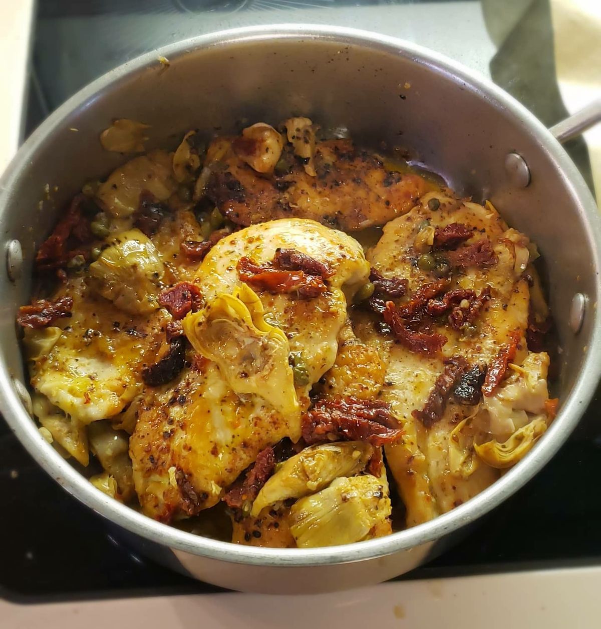 MEDITERRANEAN CHICKEN WITH SUN-DRIED TOMATOES, ARTICHOKES, AND CAPERS