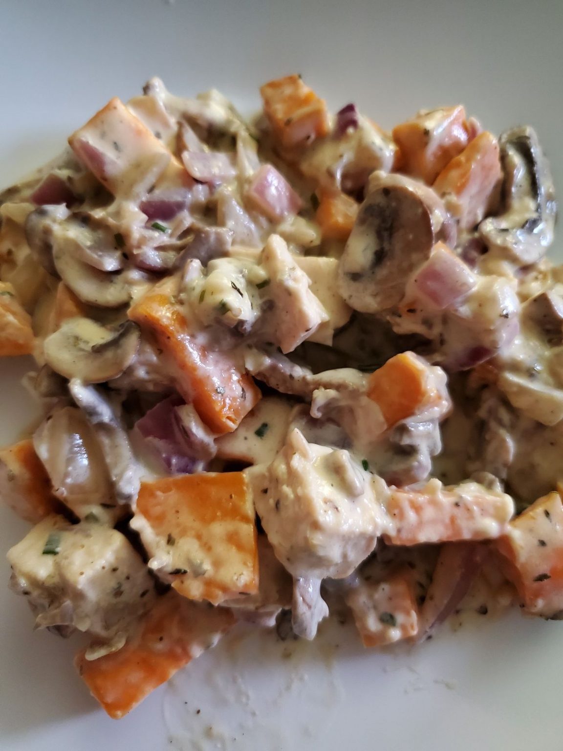 SLOW COOKER CREAMY GARLIC PORK CHOPS WITH MUSHROOMS AND POTATOES